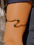 Marea | Brazalete fino de ola dorado