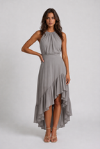 Sara | Vestido halter con volantes asimétricos