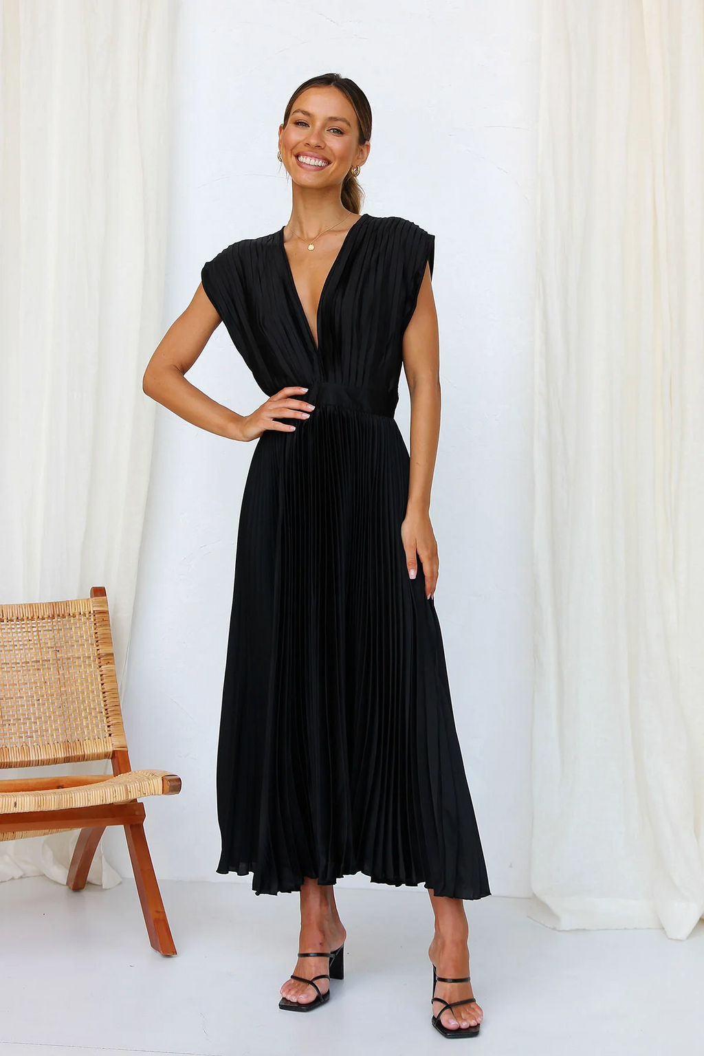 Tirsa | Vestido glamuroso que capta la luz