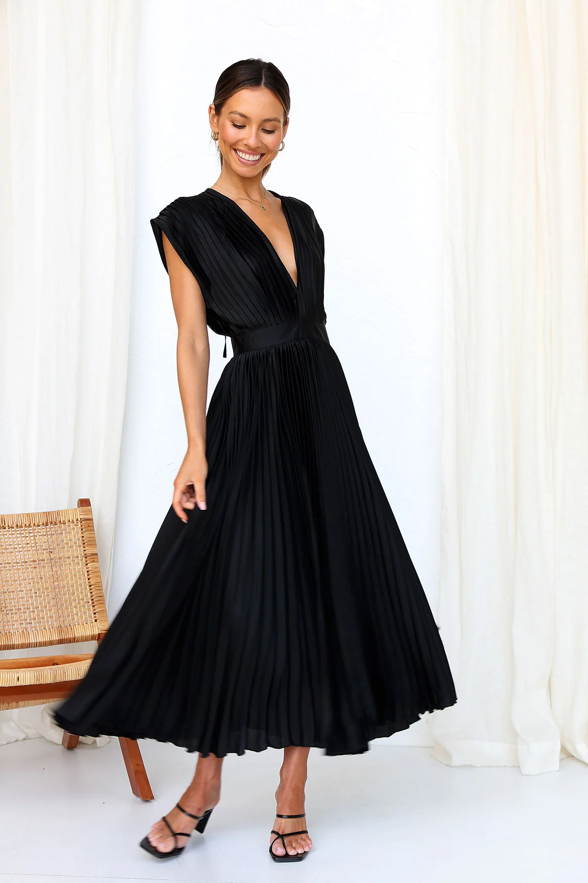 Tirsa | Vestido glamuroso que capta la luz