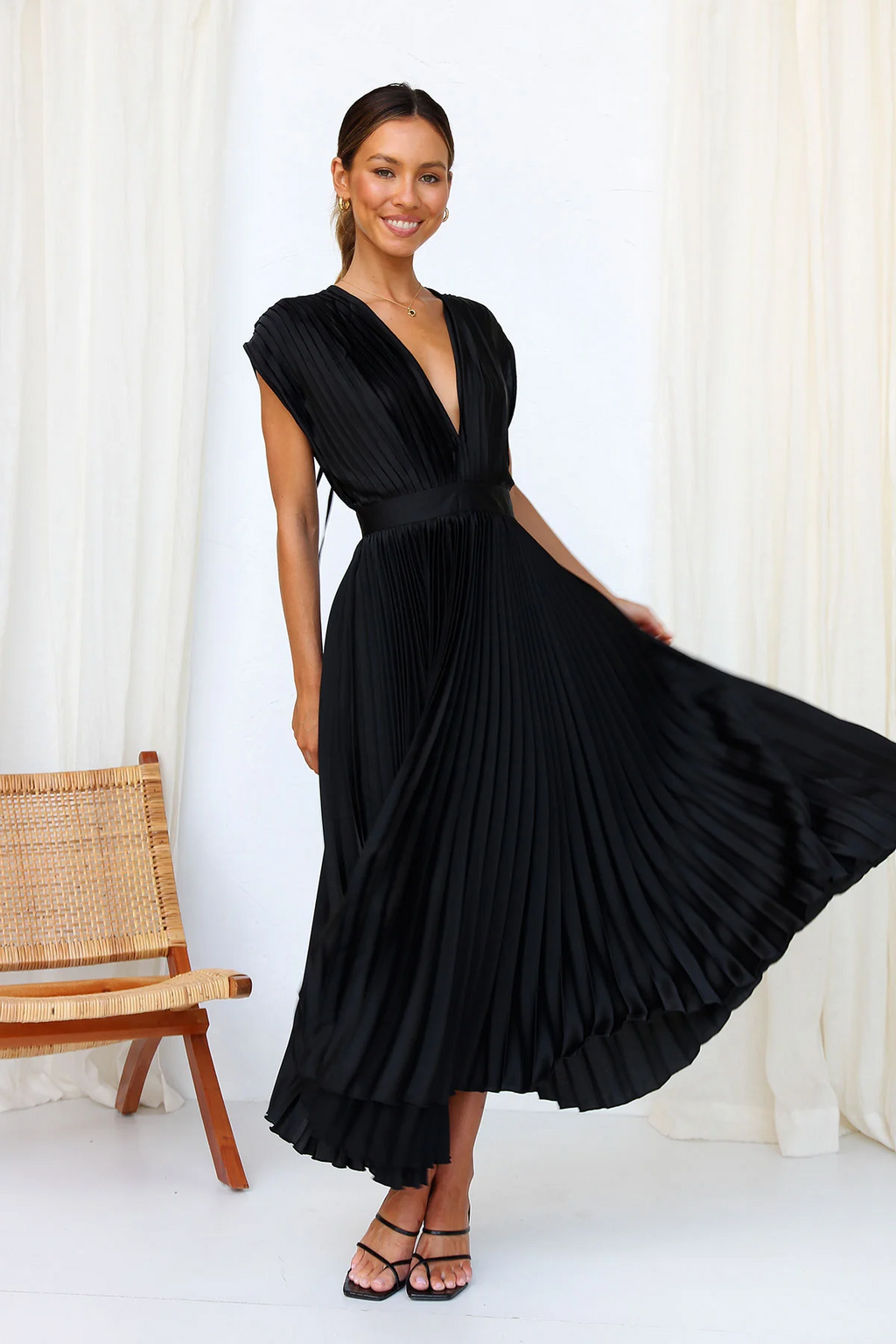 Tirsa | Vestido glamuroso que capta la luz