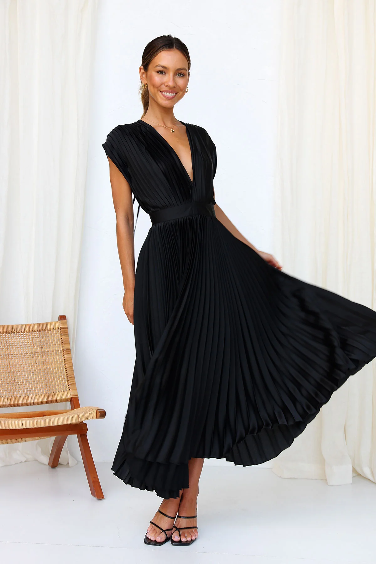 Tirsa | Vestido glamuroso que capta la luz