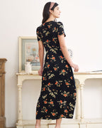 Vestido largo negro de manga corta con cuello en V y estampado floral