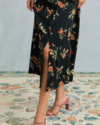 Vestido largo negro de manga corta con cuello en V y estampado floral